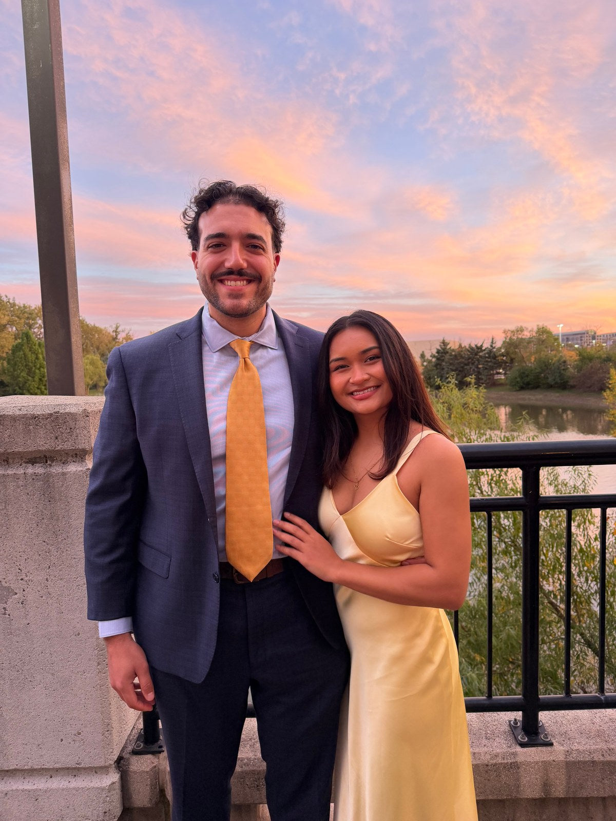 Anthony and his girlfriend together at sunset